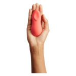 Потужний мінівібромасажер Touch X Crave Coral by We-Vibe, зручно поєднувати з проникним сексом